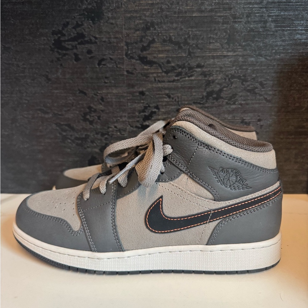 Nike Gray and Black Jordan 1 Mid Sneakers